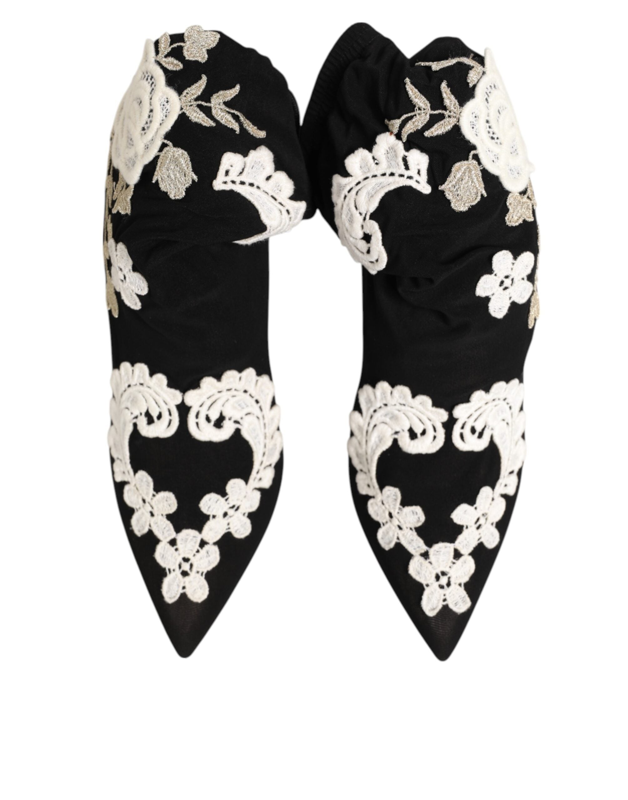 Black pointed-toe ankle boots in soft material with intricate white and metallic floral lace embroidery.