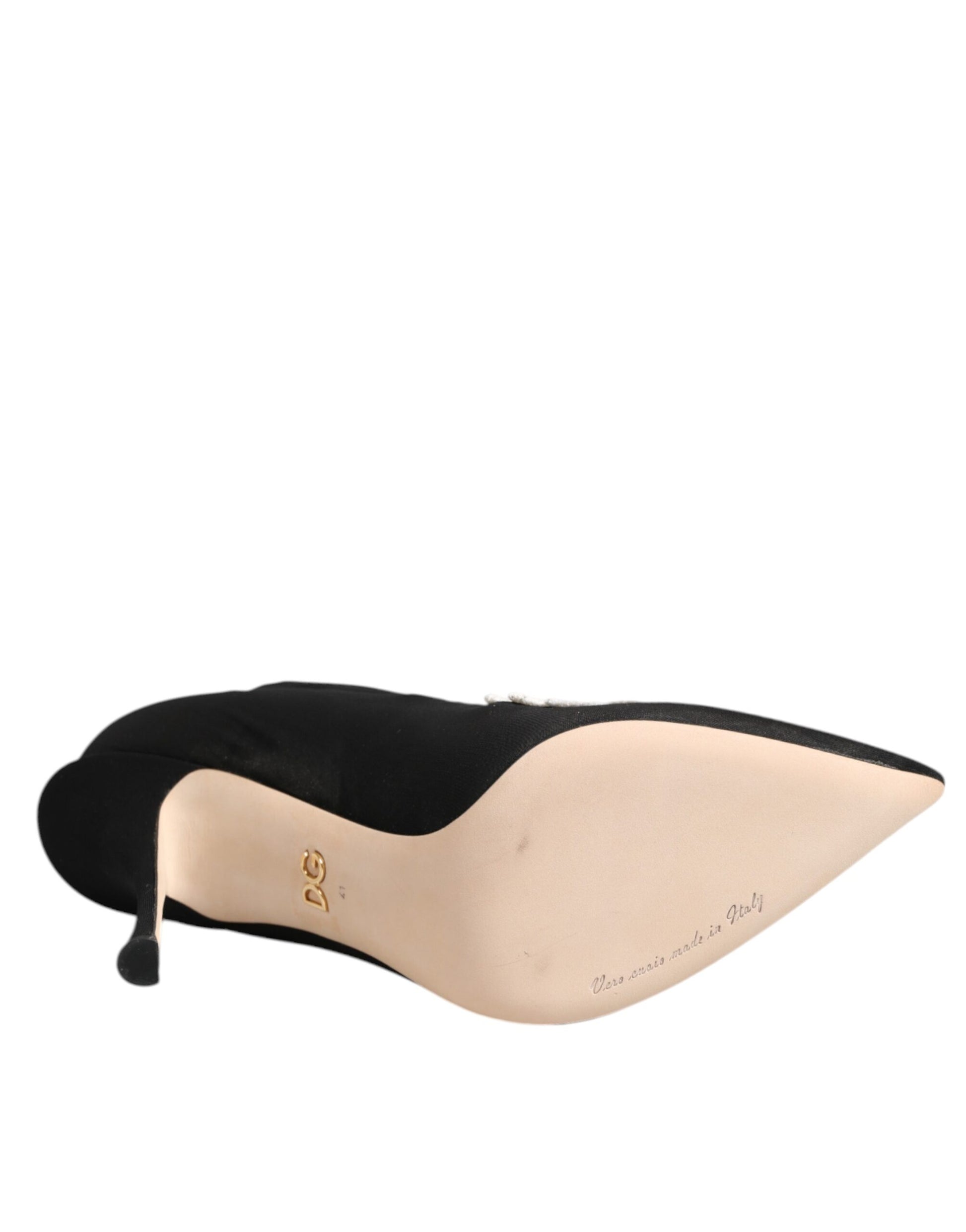 Black satin stiletto pump with a pointed toe and beige sole featuring gold Dolce & Gabbana branding.