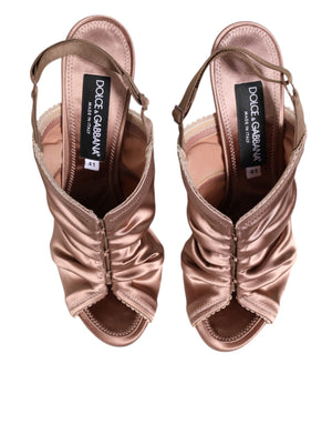 Bronze satin Dolce & Gabbana slingback sandals featuring a ruched upper, open toe, and elasticated heel strap.