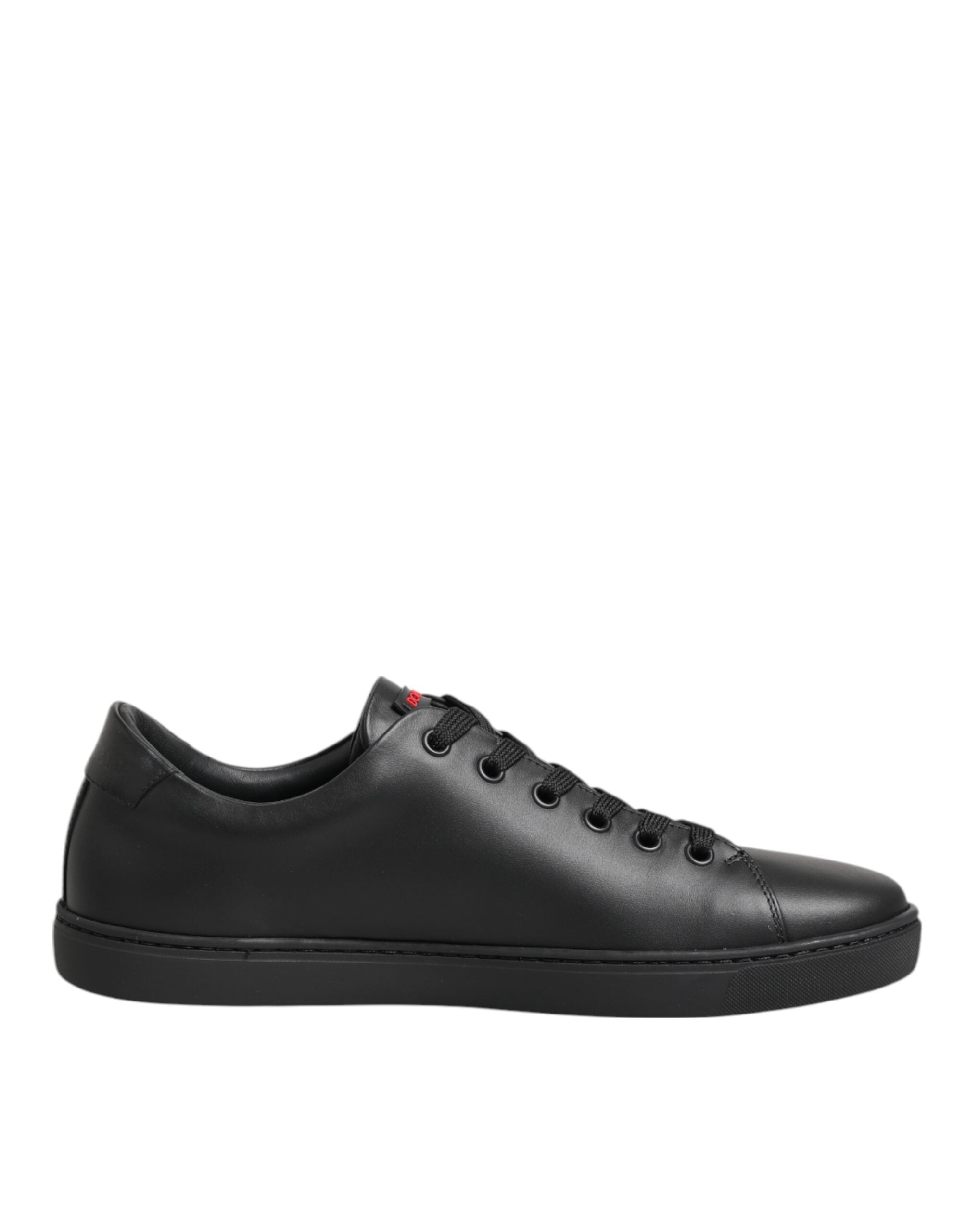 Dolce & Gabbana black leather low-top sneakers with matching laces and a sleek, minimalist silhouette.
