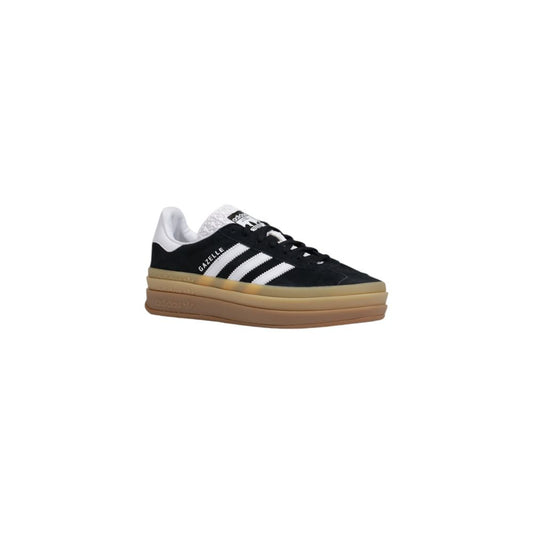 Adidas Originals black suede low-top sneaker with white three-stripes, white heel tab, and stacked gum platform sole.