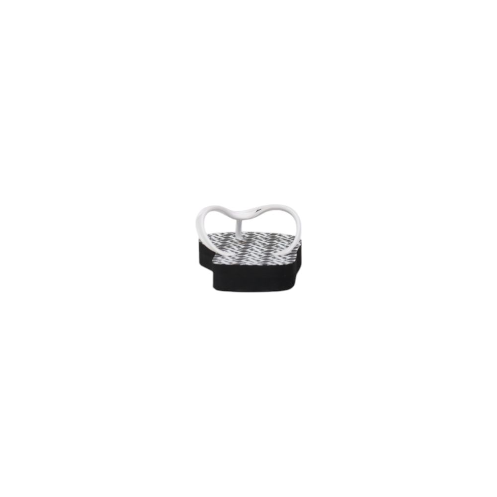 Armani Exchange black and white rubber flip-flop sandals with a geometric patterned footbed and white thong straps.