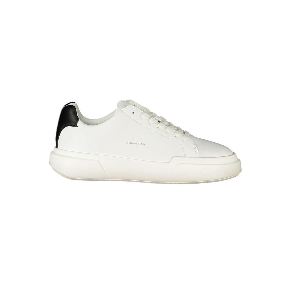 White polyurethane Calvin Klein women's low-top sneaker with a black heel tab and thick, chunky white rubber sole.