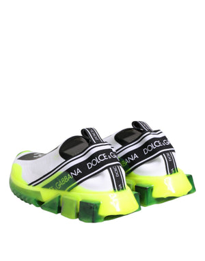 Dolce & Gabbana black and white knit slip-on sneakers with neon yellow and green chunky geometric rubber soles.
