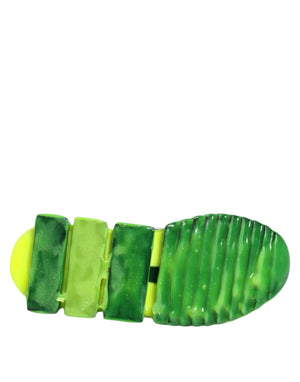 Bright green and yellow rubber sneaker outsole with a ribbed, textured tread pattern for high-performance grip.
