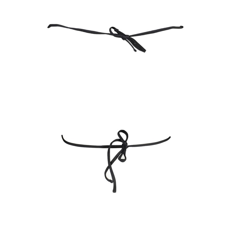 Black polyamide bikini strings tied in knots on a white background
