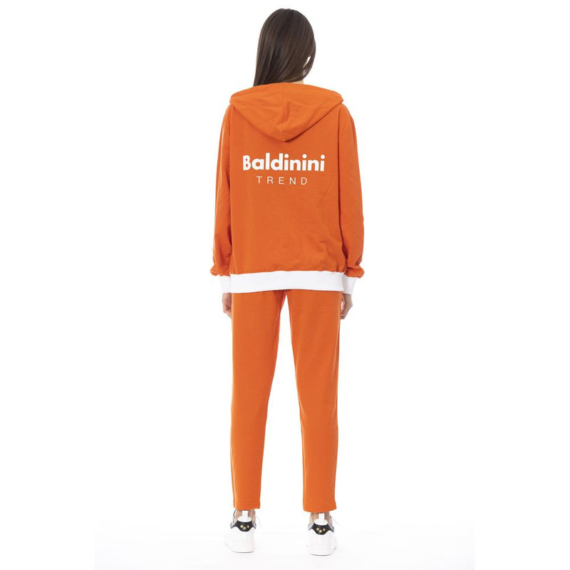 Orange cotton women's hoodie with white logo on back and matching sweatpants