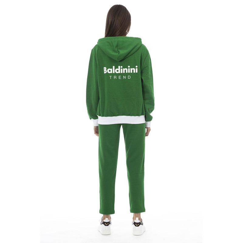 Green cotton women hoodie with white logo on the back worn with matching sweatpants