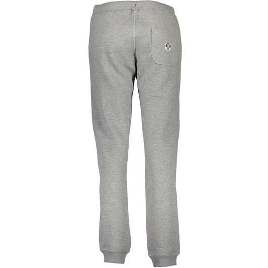 Grey cotton women's track pants with cuffed ankles and a back pocket