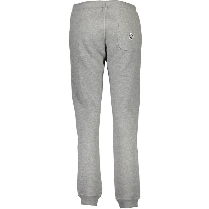 Grey cotton women's track pants with cuffed ankles and a back pocket
