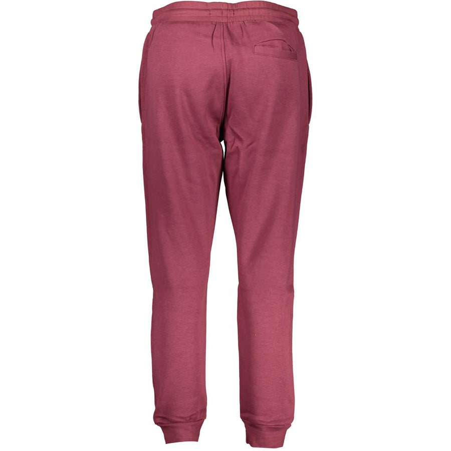 Maroon polyester women's tracksuit pants with a drawstring waist and cuffed ankles