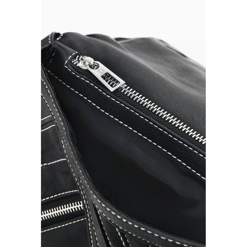 Black polyurethane backpack with a silver zipper and white stitching detail