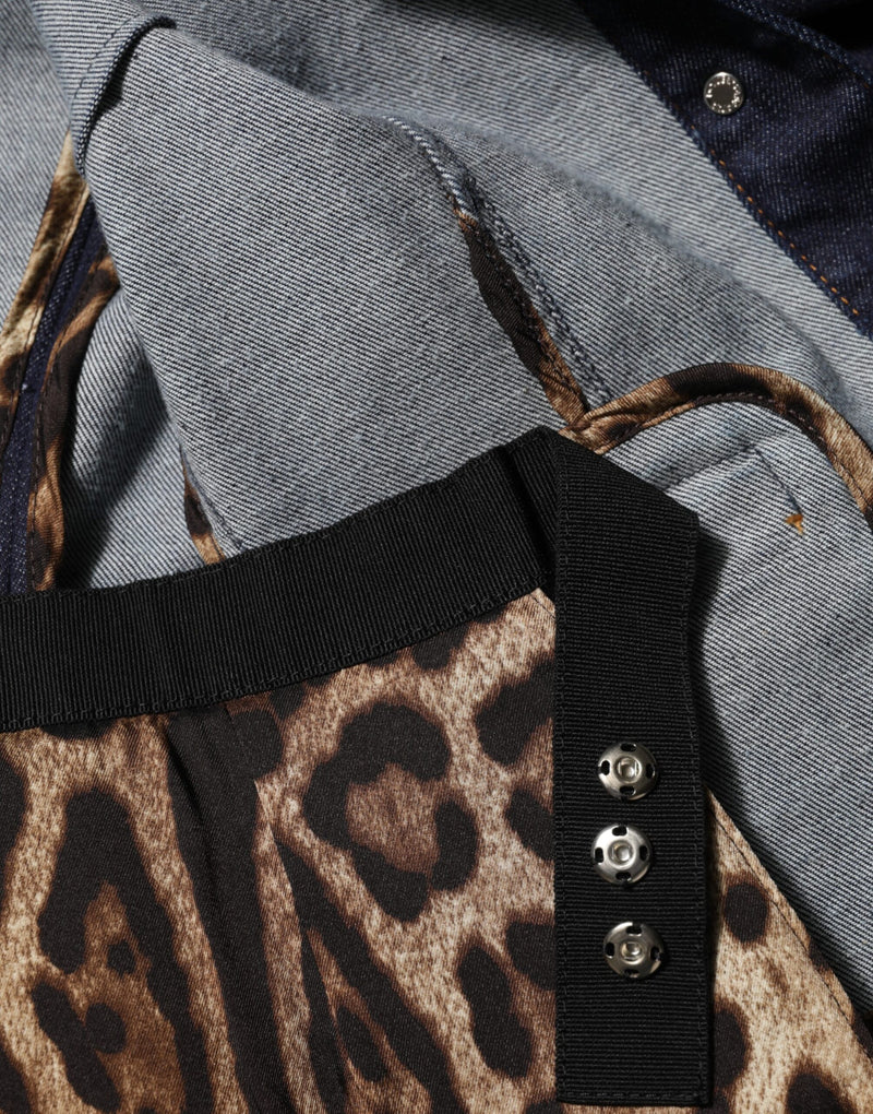 Close-up of dark blue cotton denim jacket with leopard print lining and snap buttons