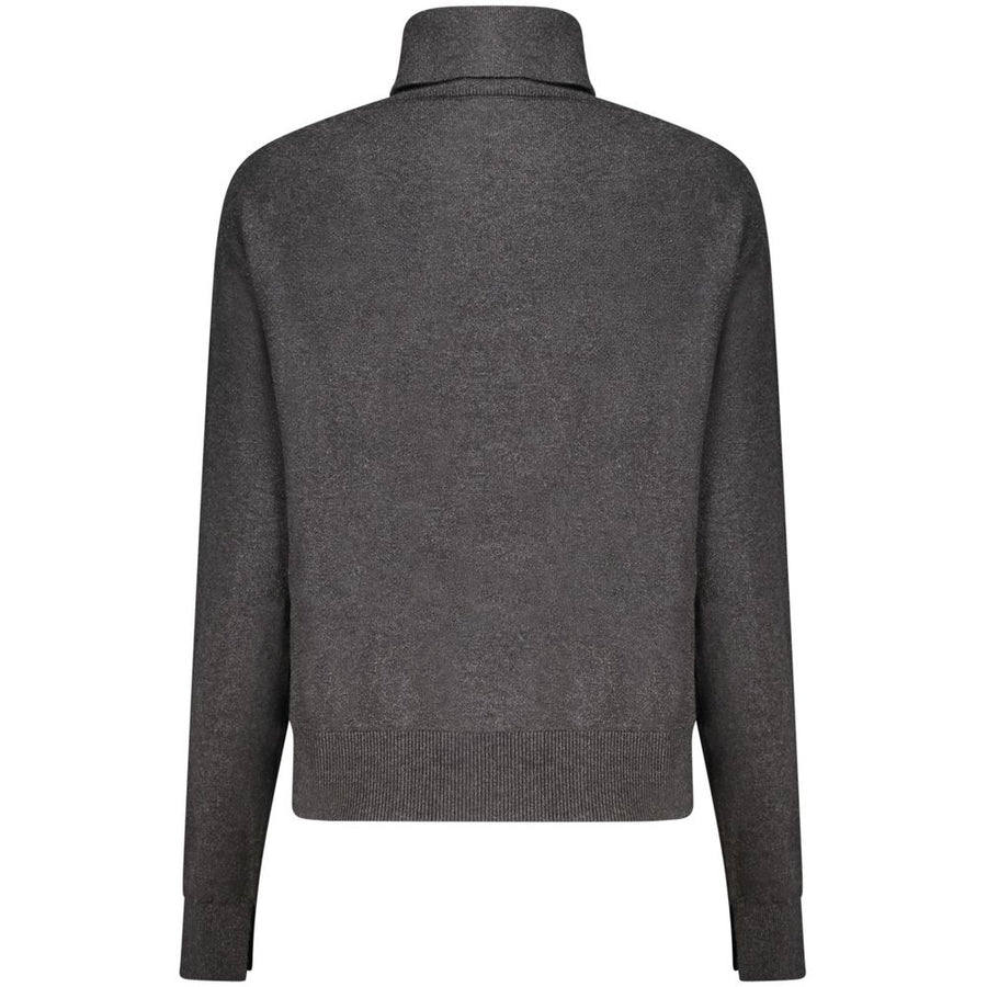Black cotton turtleneck sweater with long sleeves and ribbed cuffs