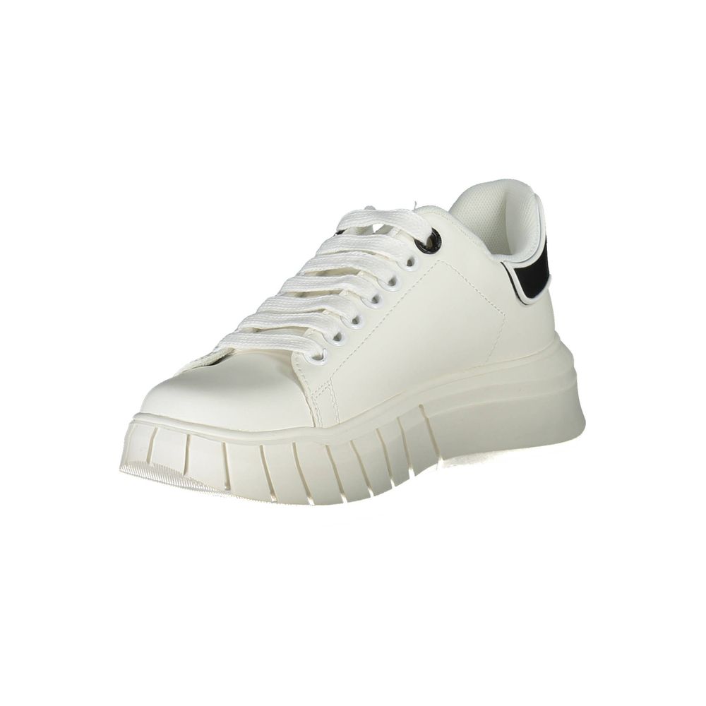 Gaelle Paris white polyurethane women's sneaker with lace-up closure, black heel tab, and chunky rubber sole.