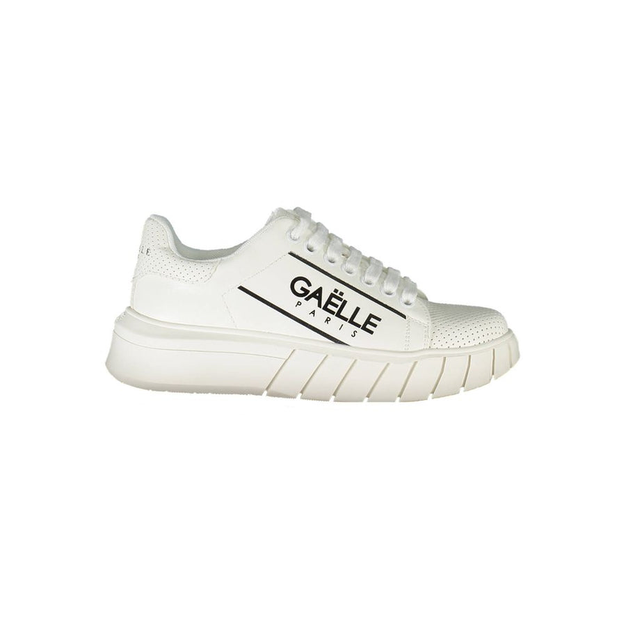 White Gaelle Paris low-top sneaker featuring perforated leather details, lace-up closure, and a chunky rubber sole.