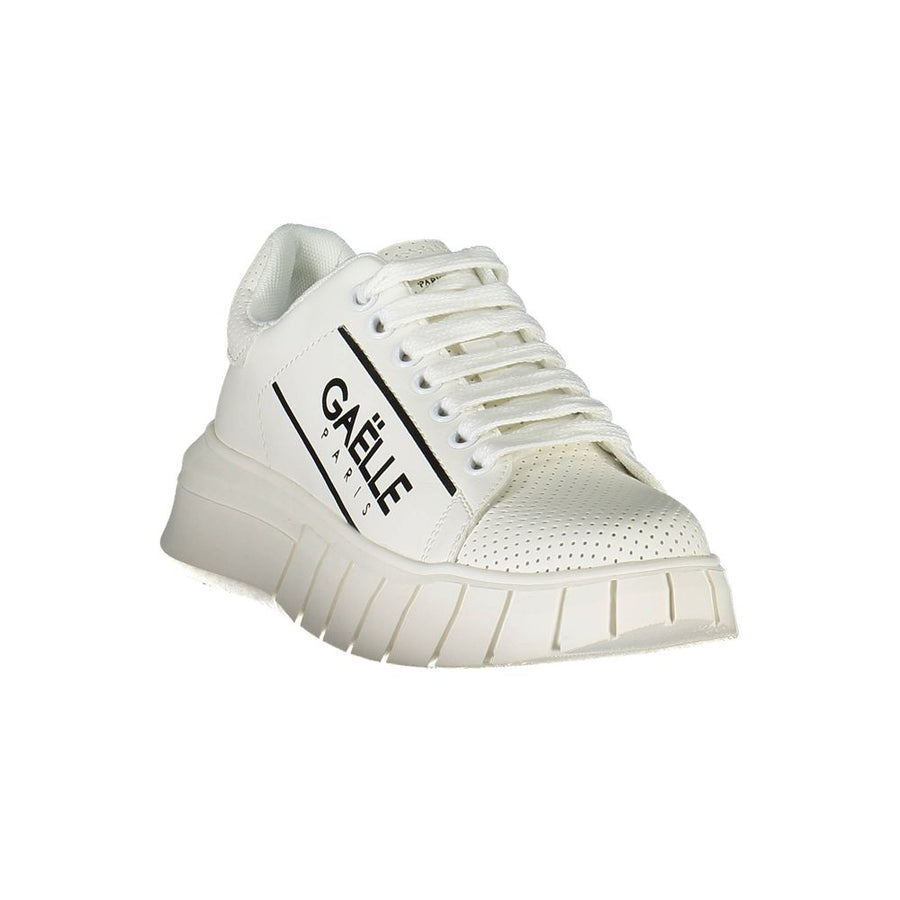 White Gaelle Paris low-top sneaker featuring perforated leather details, lace-up closure, and a chunky rubber sole.