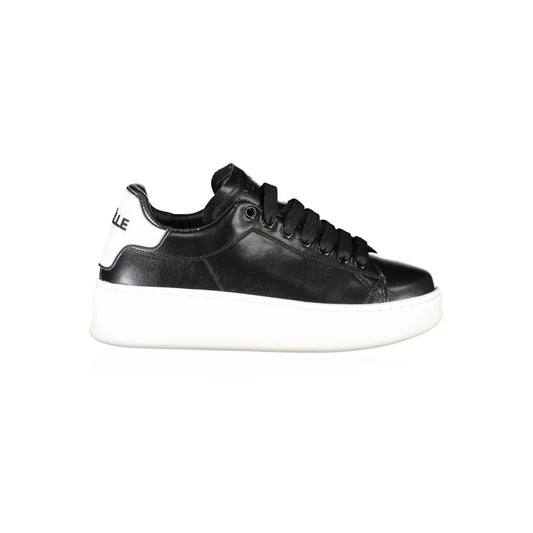 Gaelle Paris black polyurethane sneaker with lace-up front, thick white rubber sole, and white branded heel tab.