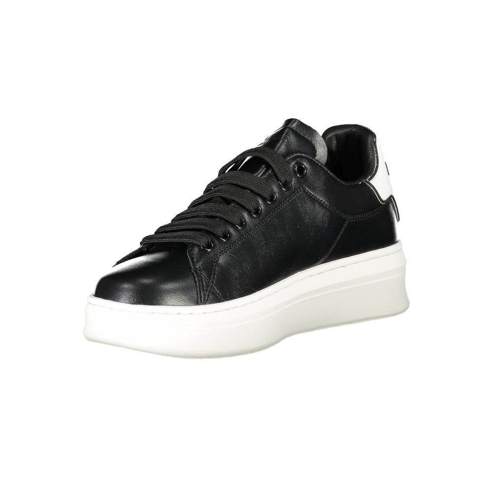 Gaelle Paris women's black polyurethane sneaker with matching laces and a chunky white platform sole.