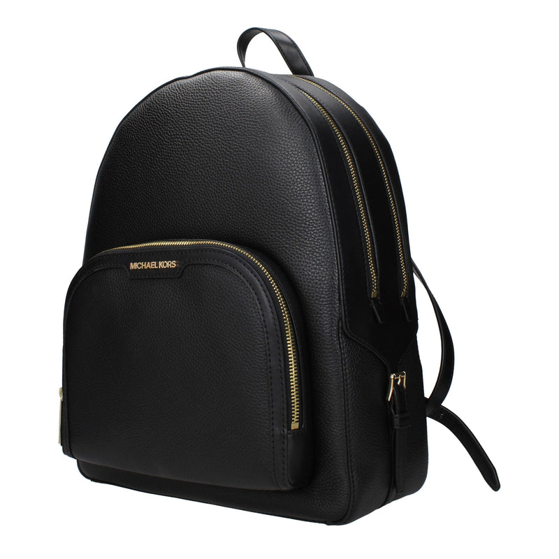 Black pebbled leather backpack with gold zippers and Michael Kors logo
