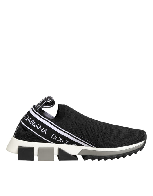Black stretch-knit Dolce & Gabbana Sorrento slip-on sneaker with white logo band and geometric white/grey sole.