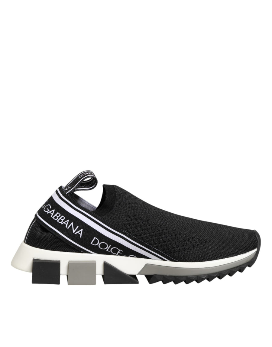 Black stretch-knit Dolce & Gabbana Sorrento slip-on sneaker with white logo band and geometric white/grey sole.