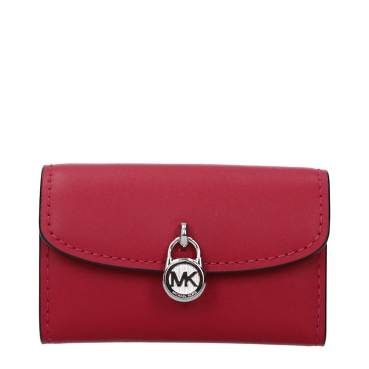 Red leather Michael Kors wallet with a silver padlock closure featuring the MK logo