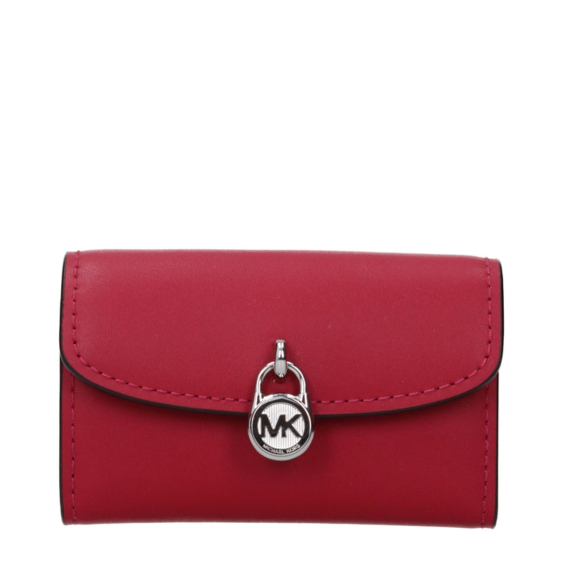 Red leather Michael Kors wallet with a silver padlock closure featuring the MK logo