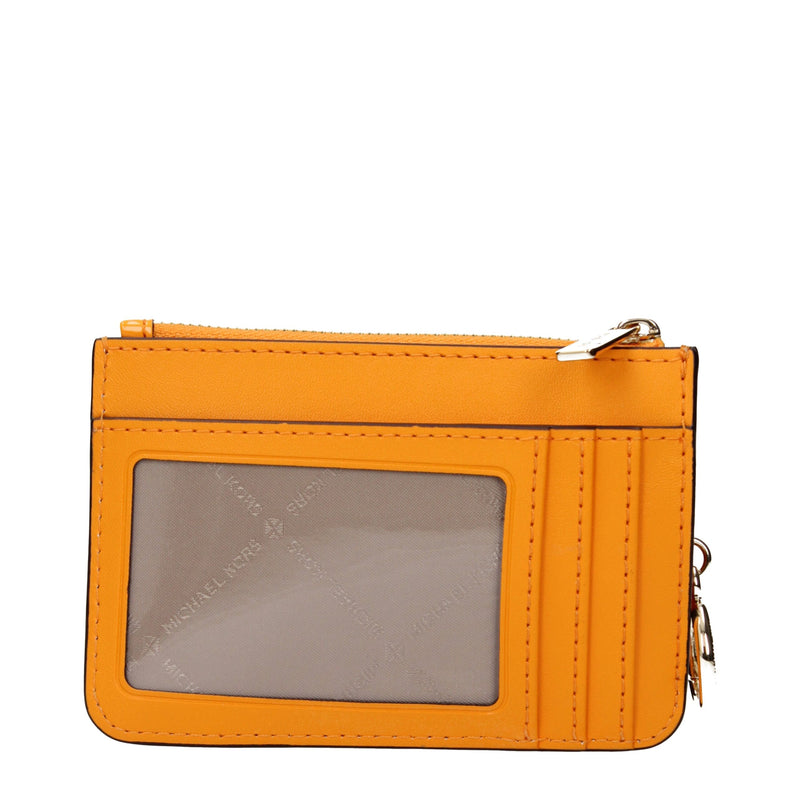 Bright orange leather card case wallet with a clear ID window and zipper top