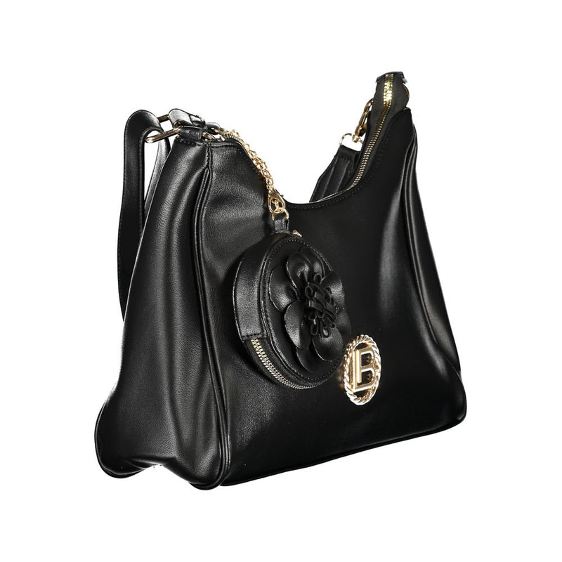Black PVC hobo handbag with gold hardware and a matching coin pouch featuring a flower appliqué