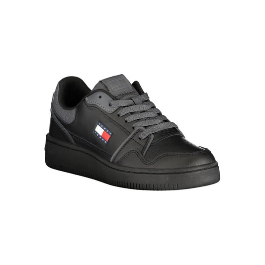 Tommy Hilfiger women's black polyurethane low-top sneaker with lace-up closure and side flag logo.