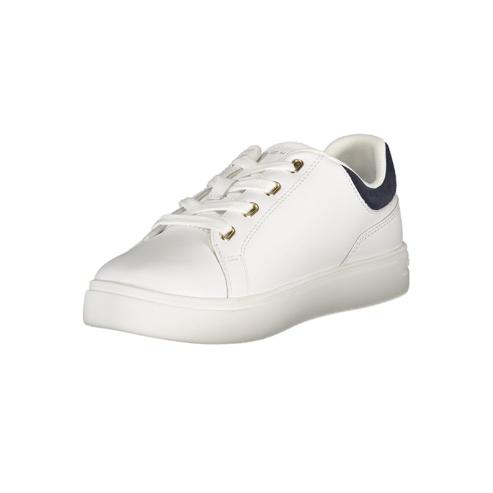 White polyurethane women's sneaker with gold eyelets, white laces, and a navy blue heel accent.