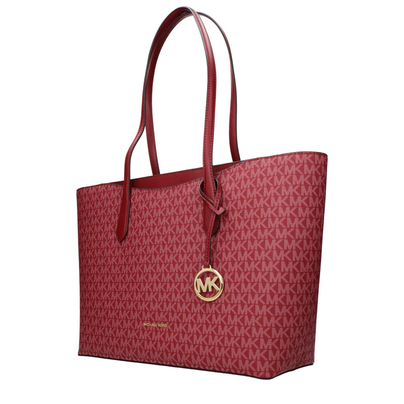 Red fabric monogram shoulder bag with dual top handles and gold MK logo charm