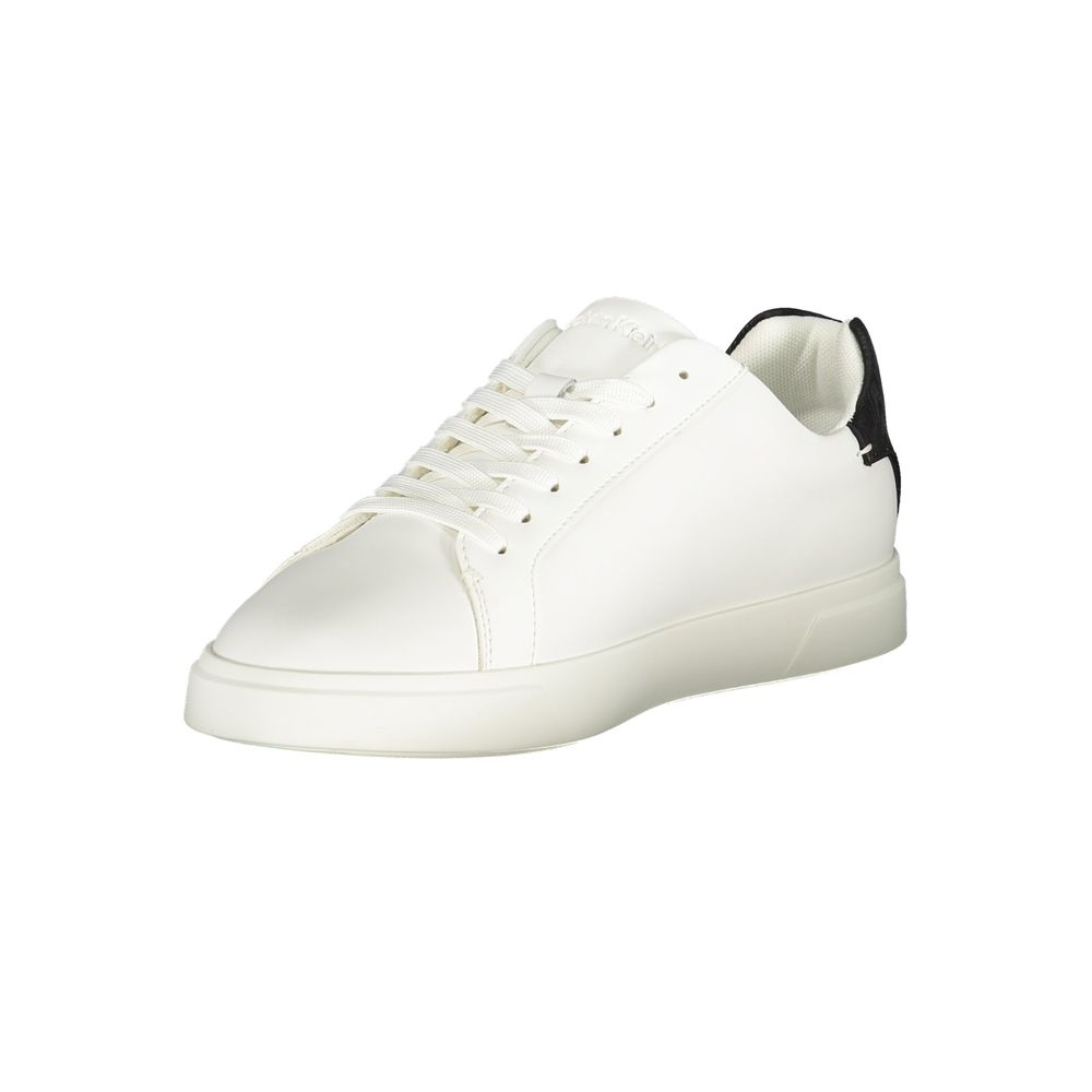 White polyurethane women’s sneaker with a lace-up front, flat sole, and a black heel accent.