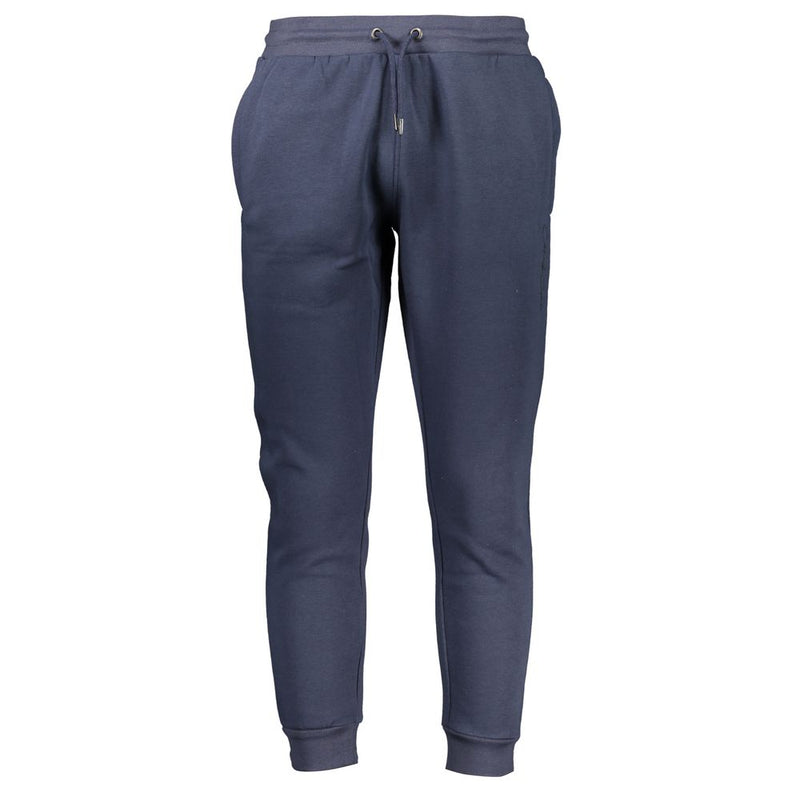 Blue polyester women's sweatpants with a drawstring waist and cuffed ankles