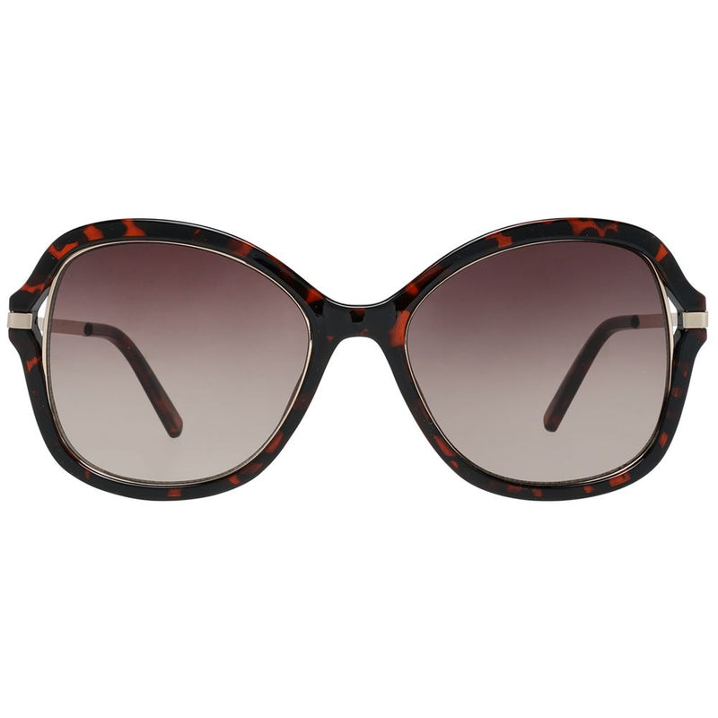 Brown tortoiseshell sunglasses with rounded frames and gradient lenses
