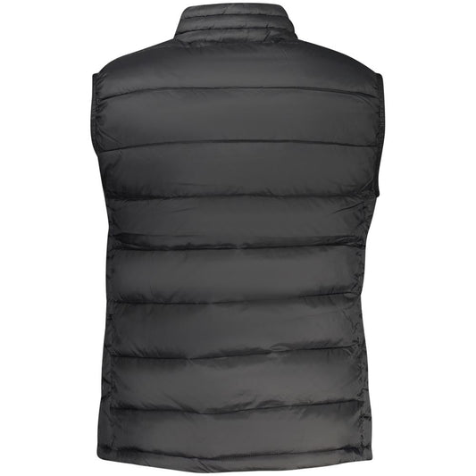 Back view of a black polyester women's puffer vest