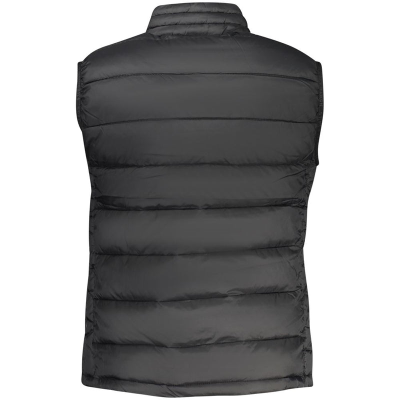 Back view of a black polyester women's puffer vest