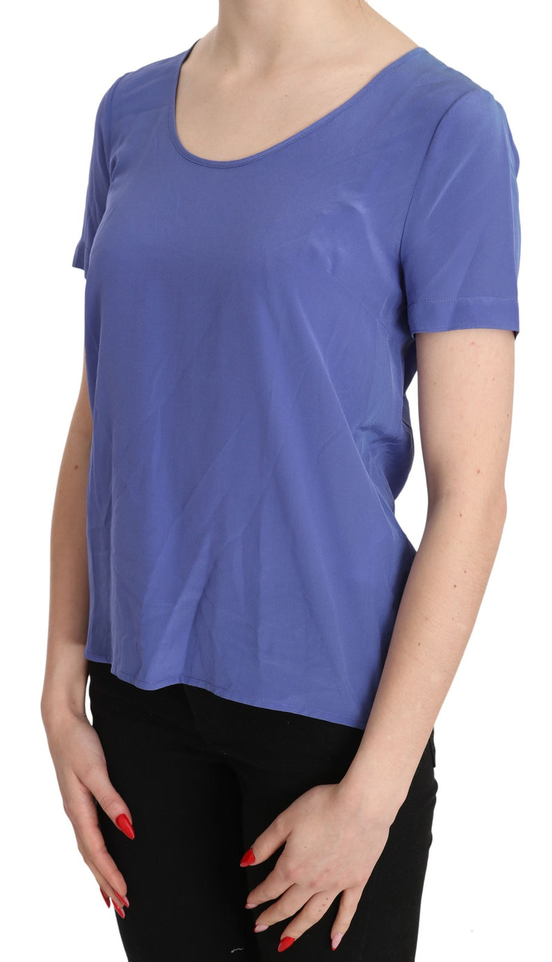 Purple silk short sleeve casual blouse with a scoop neckline worn with black pants